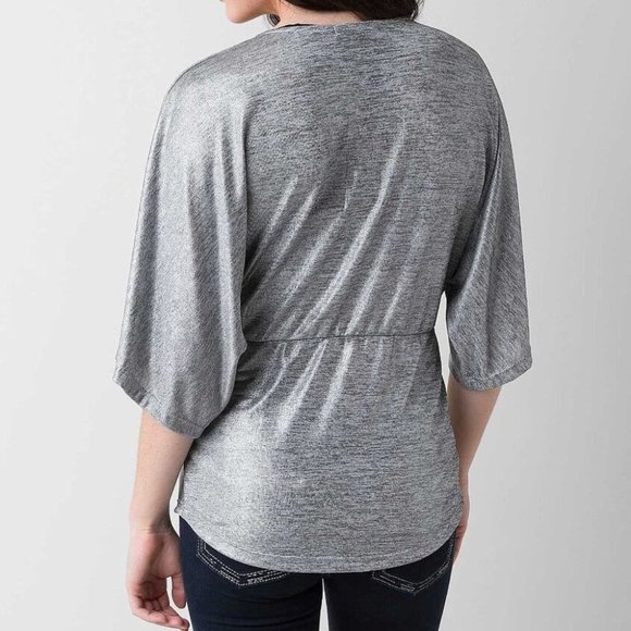 BKE Boutique Metallic V-Neck Peplum Top - Picture 2 of 8